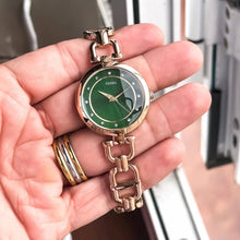 The ARP Fos**l Rose Gold & Emerald Green Watch for Women