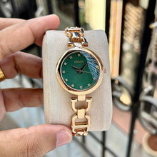 The ARP Fos**l Rose Gold & Emerald Green Watch for Women